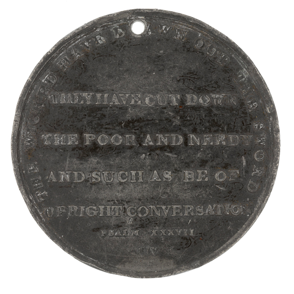 This medal, issued to commemorate the massacre, includes the dedication ‘They have cut down the poor and needy and such as be of upright conversation’. 