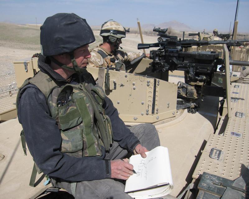 Jules George sketching in Afghanistan in 2010