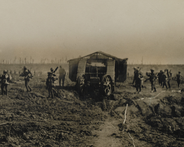 British infantry advance alongside a Mark I tank, 1916