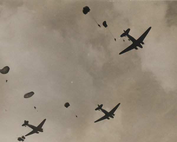 C-47 transport aircraft dropping parachutists and supply canisters on the outskirts of Arnhem, 17 September 1944