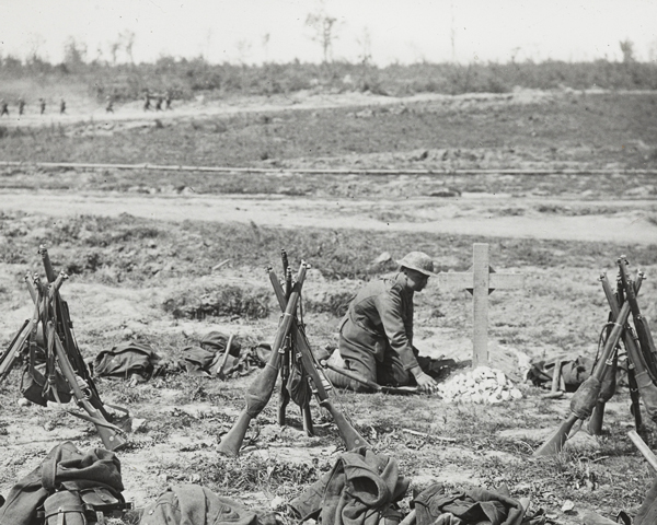 Tending a grave near Mametz Wood, 1916