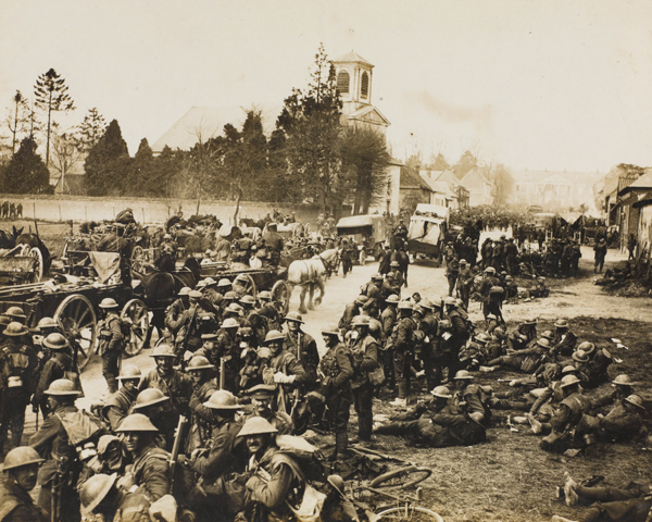 Soldiers of 17th (Northern) Division gather at Henencourt after the evacuation of Hermies, 26 March 1918 