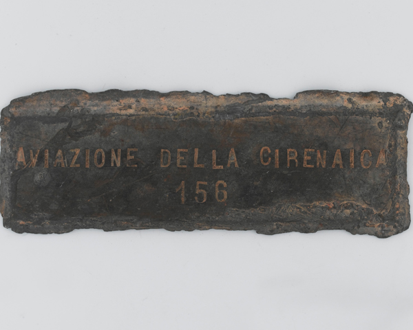 Plaque from the wreck of an Italian Savoia Marchetti SM79 aircraft destroyed by the LRDG at Jebel Uweinat, c1940  