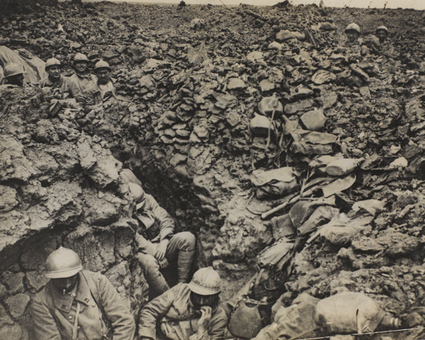 French soldiers of the 87th Regiment shelter in their trenches at Côte 304 at Verdun, 1916