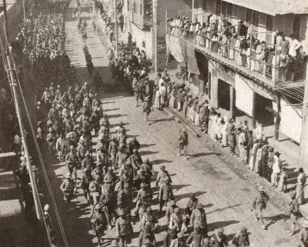 Turkish prisoners being marched down Main Street, Baghdad, March 1917