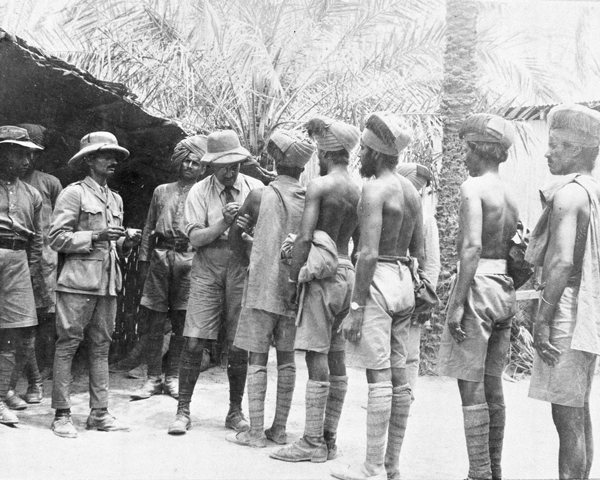 Indian troops line up to receive inoculations, 1916