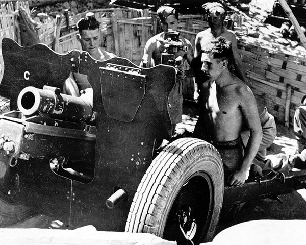Firing a 3.7 in howitzer during the Battle of the Ngakyedauk Pass, February 1944 