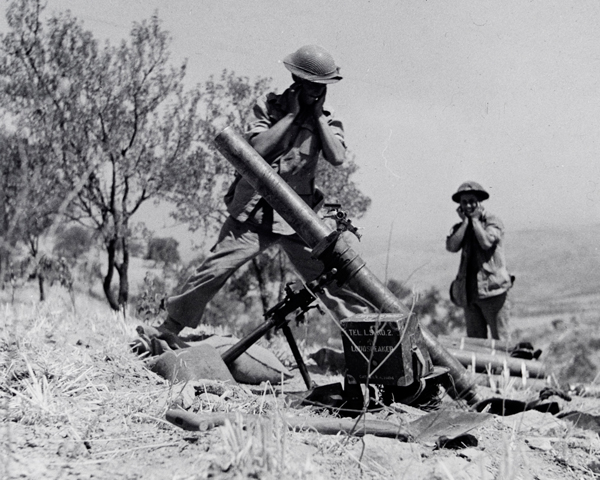 Using a 4.2 inch mortar near Adrano, Sicily, 1943
