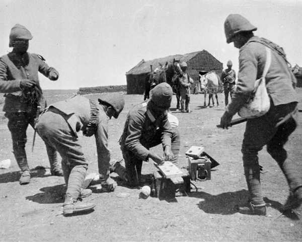 Royal Engineers preparing to blow up a Boer farm, c1901