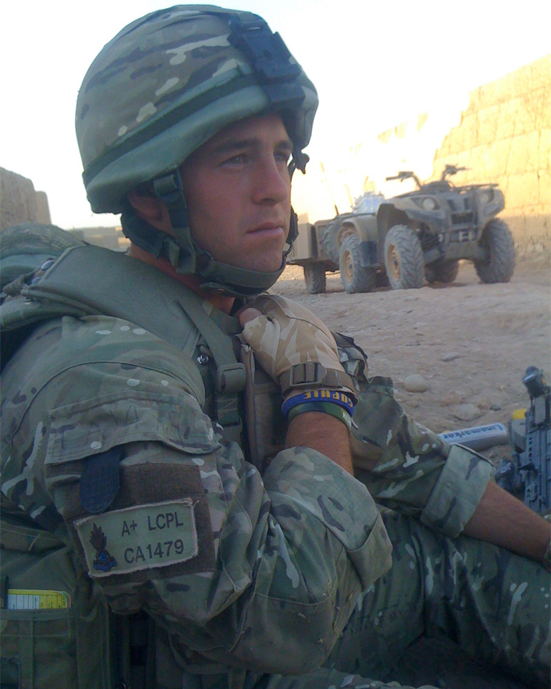 Lance Corporal De Matos on tour in Afghanistan wearing his lucky wristband, c2010