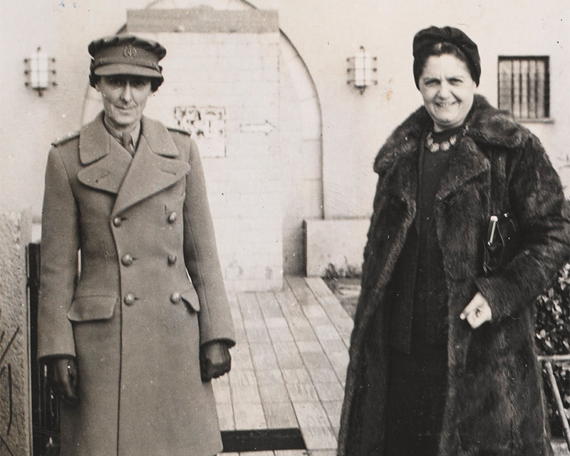 Audrey Chitty and Hadassah Samuel outside the hall where the first recruitment meeting for the Palestinian ATS was held, Tel Aviv, 24 December 1941
