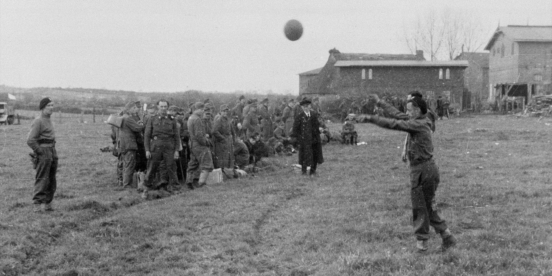 The Officers’ Mess staff start a game of football, Germany, 7 May 1945