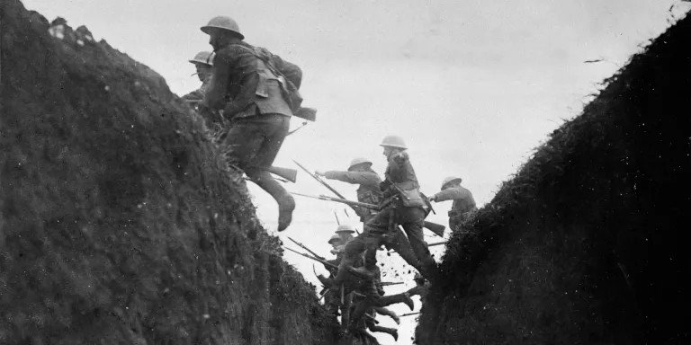 Troops in training jumping over trench, c1916
