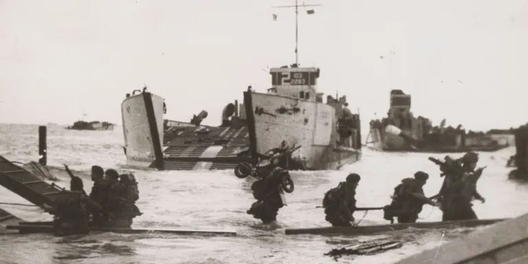 Troops disembarking from a landing craft, 6 June 1944