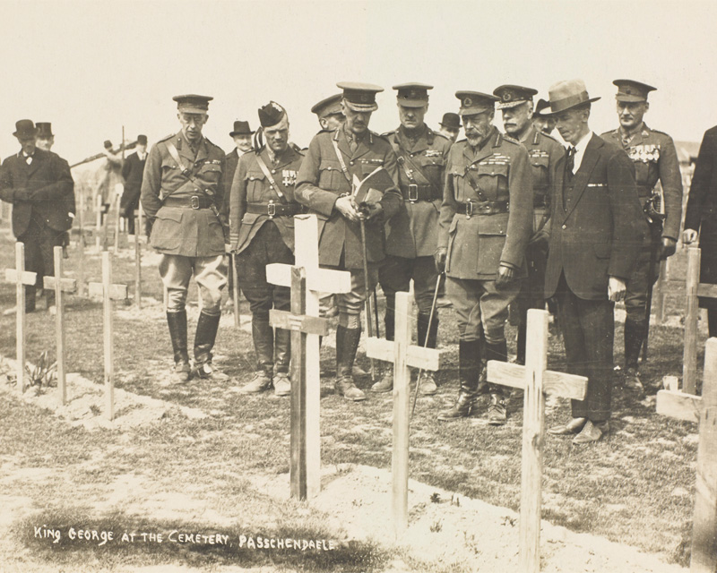 King George V inspects the graves of those killed during the Battle of Passchendaele in the cemetery at Tyne Cot during his visit to the battlefields of France and Belgium in 1922