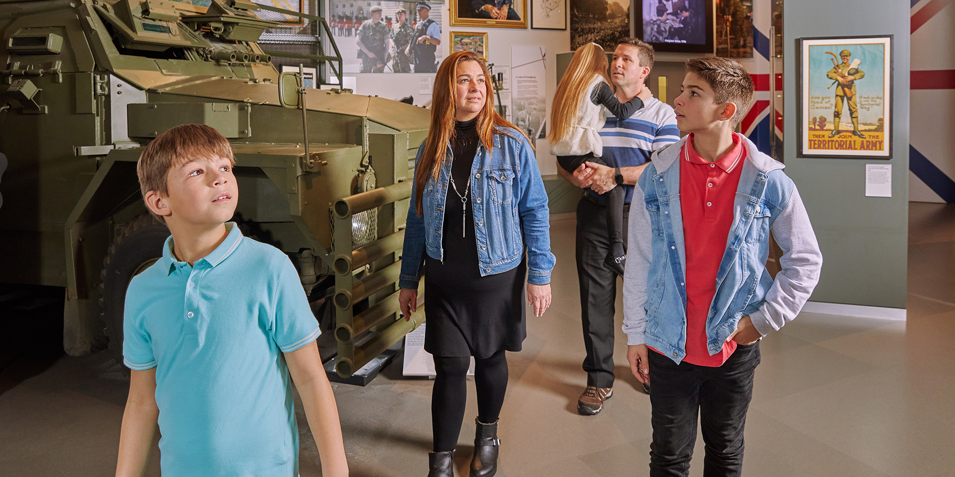 A family exploring the Army at Home gallery