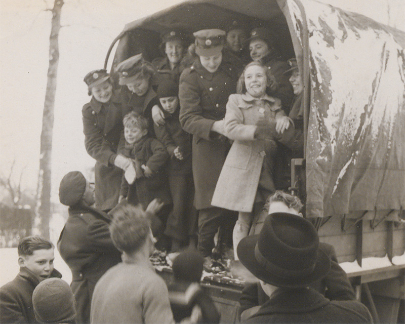 Locals offering a warm welcome to the ATS upon their arrival in Belgium