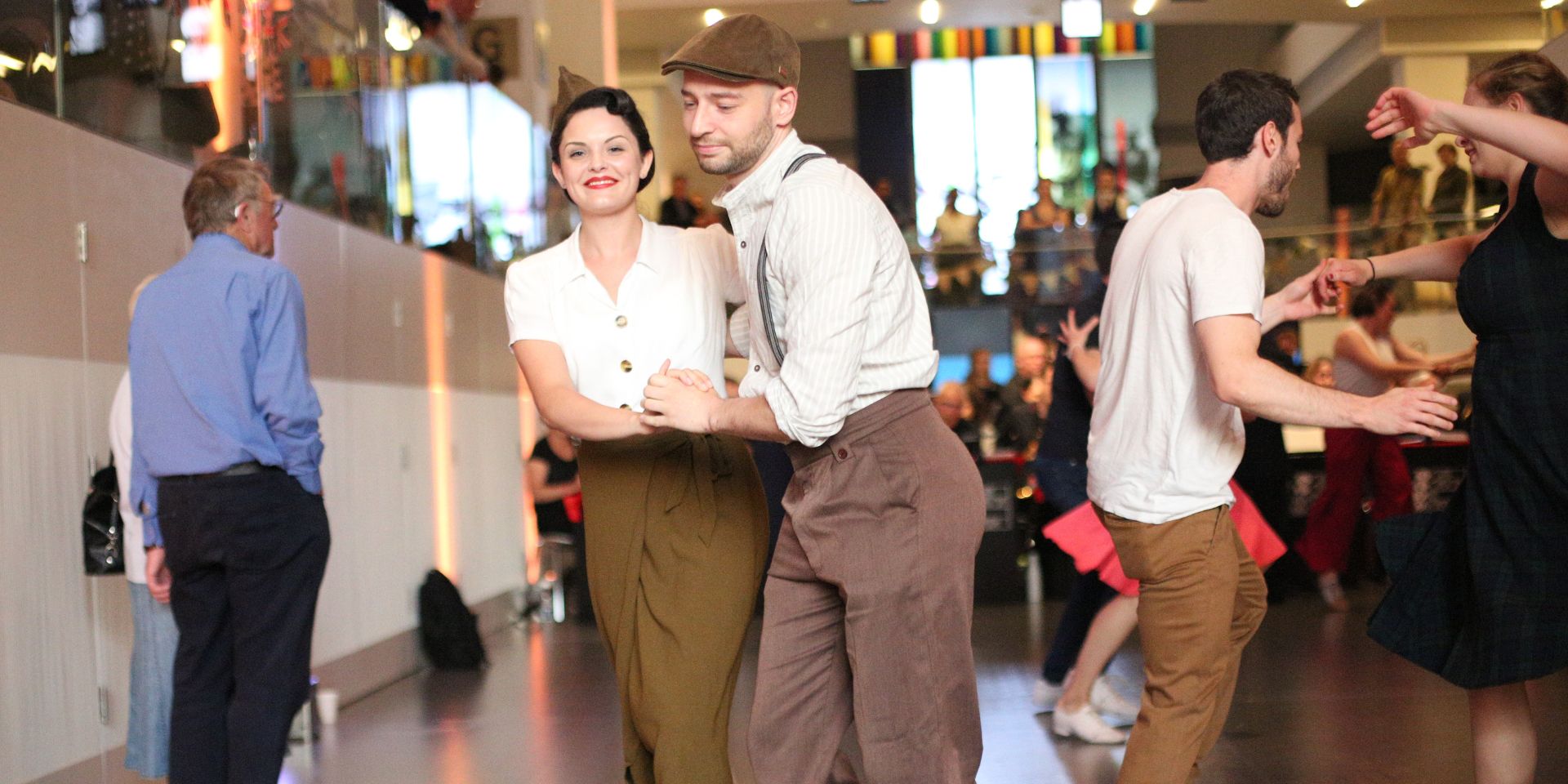 People dressed in 1940s style dancing at the National Army Museum