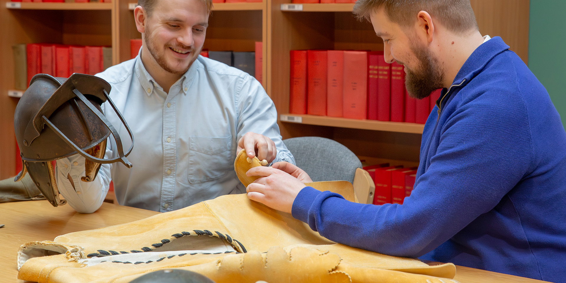 People feeling the textures of items in the handling collection