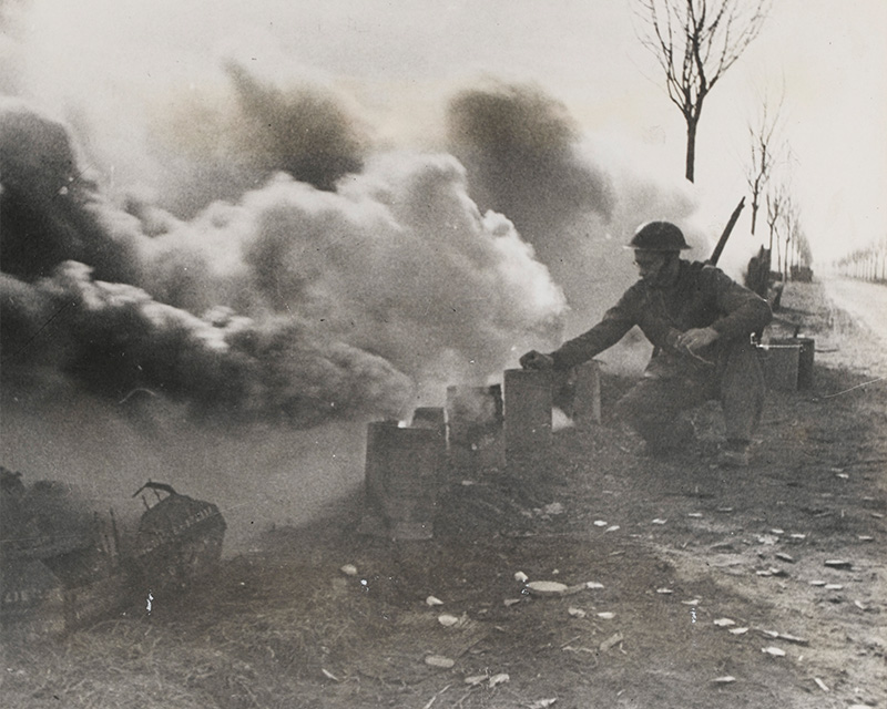 British soldier preparing a smoke screen along the banks of the Rhine, 1945