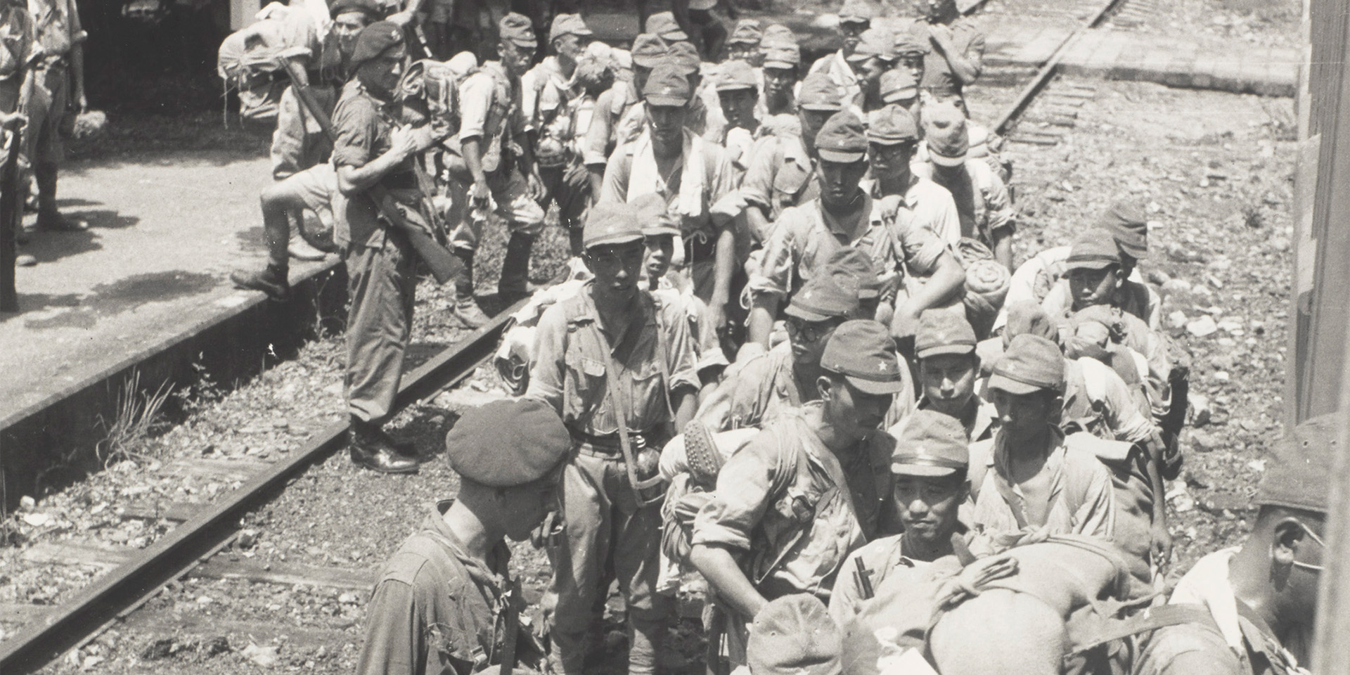 3rd Commando Brigade escorts captured Japanese soldiers, Hong Kong, 15 September 1945