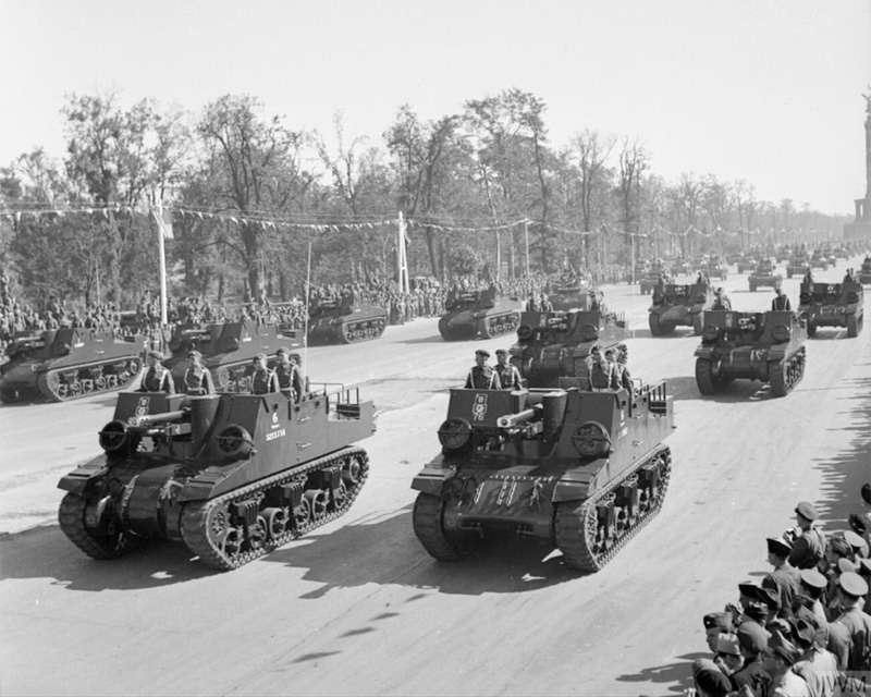 British Sexton self-propelled guns driving down the Charlottenburg Chaussee in Berlin during the Four Nations VJ Day parade, 7 September 1945