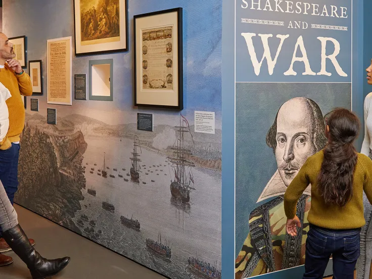 A family visiting the Shakespeare and War exhibition