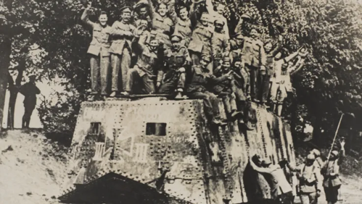 Allied soldiers on the roof of a captured A7V tank, 1918