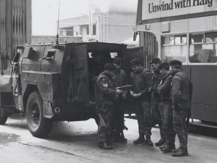 Soldiers of The Royal Regiment of Wales preparing for a patrol in the Ardoyne area of Belfast, 1972