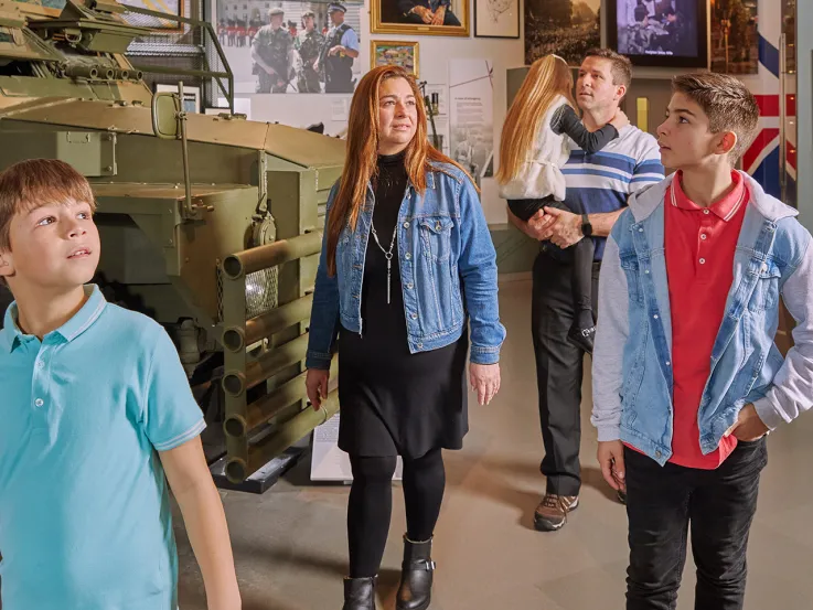 A family exploring the Army at Home gallery