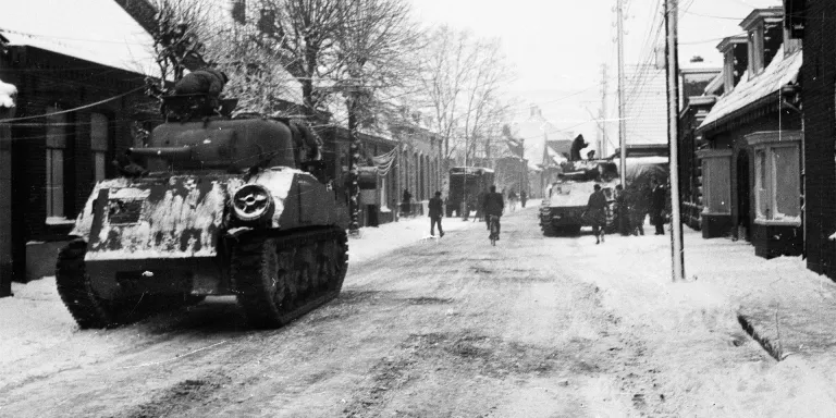 Sherman tanks in the town of Asten in the Netherlands, January 1945