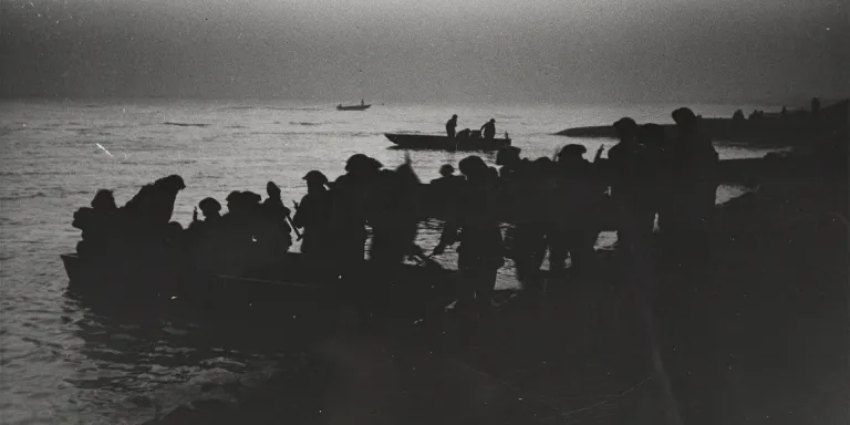 Troops boarding storm boats and crossing the Rhine at dawn, 24 March 1945