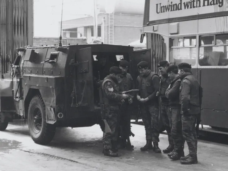 Soldiers of The Royal Regiment of Wales preparing for a patrol in the Ardoyne area of Belfast, 1972